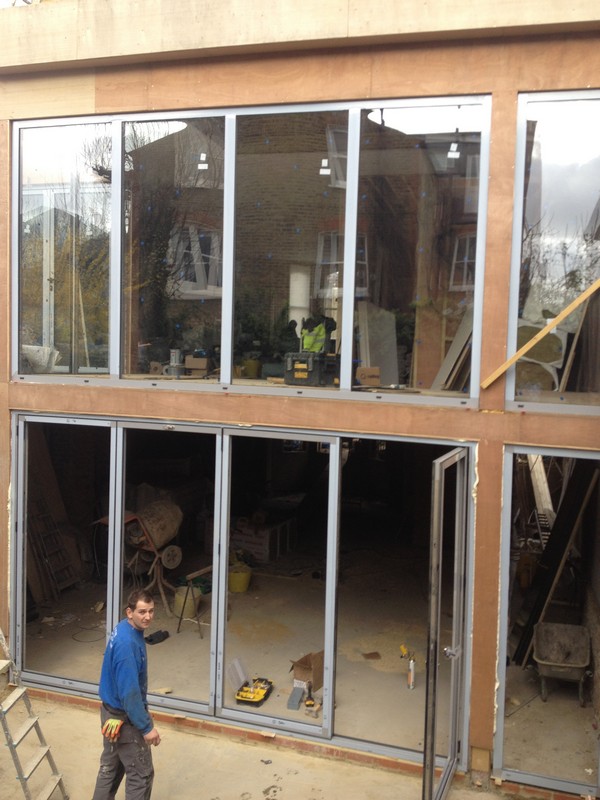 Aluminium bi-fold doors with two-storey glazing in Battersea