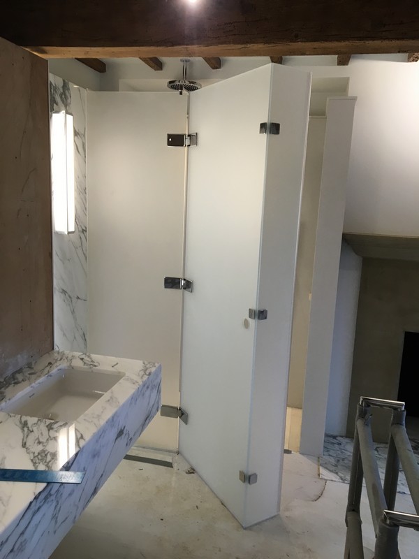 Bespoke frosted glass shower enclosure in Battersea luxury bathroom