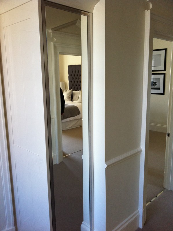 Full-length wardrobe mirror fitted in Battersea home
