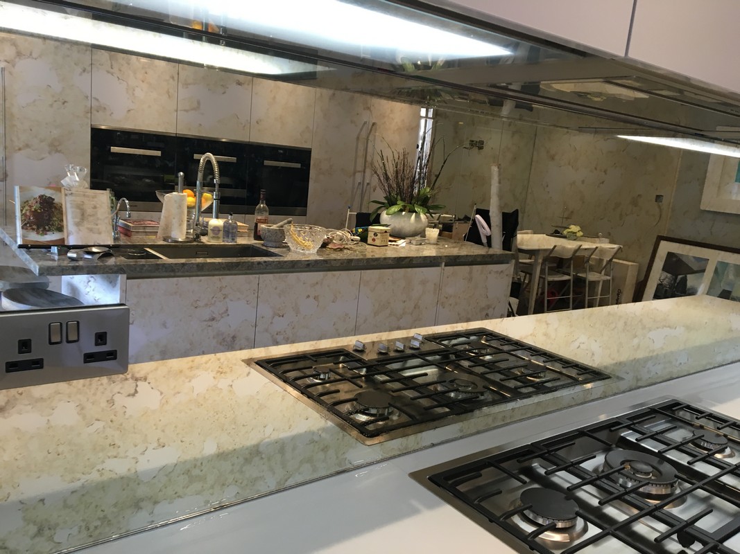 Mirror glass splashback in Battersea luxury kitchen